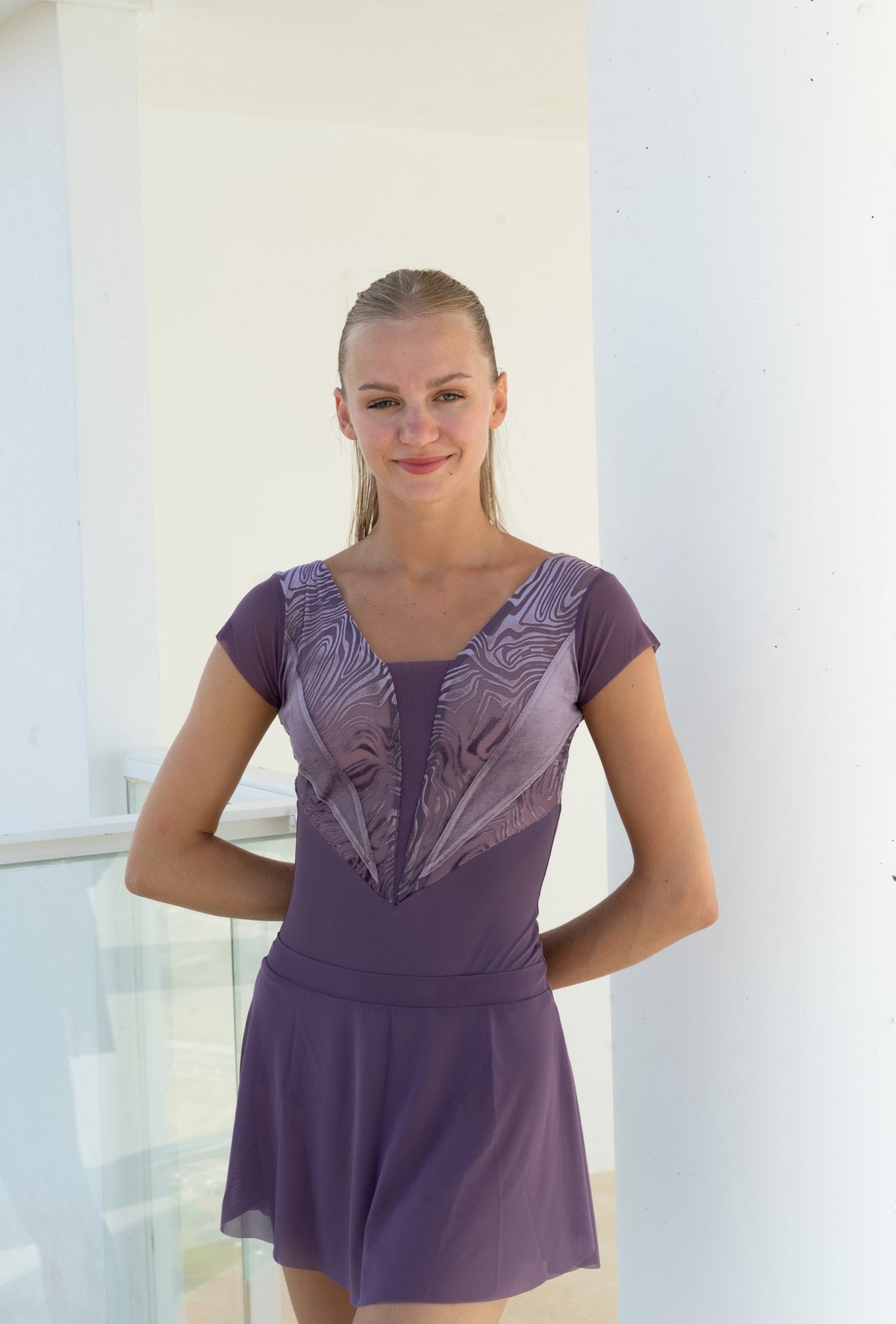 AURORA Short Sleeve Ballet and Dance Leotard in purple, front view styled with a matching skirt
